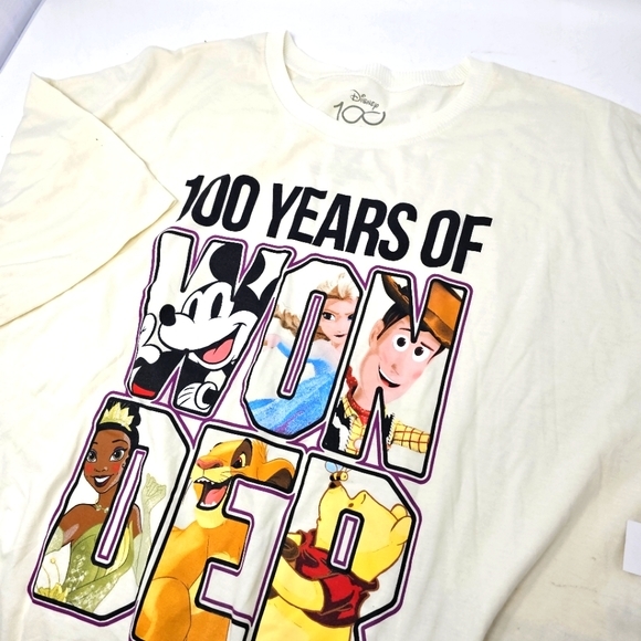 Disney Tops - Disney Pixar Characters 100 Years of Wonder Graphic S/S T-Shirt Size 3XL NWT.